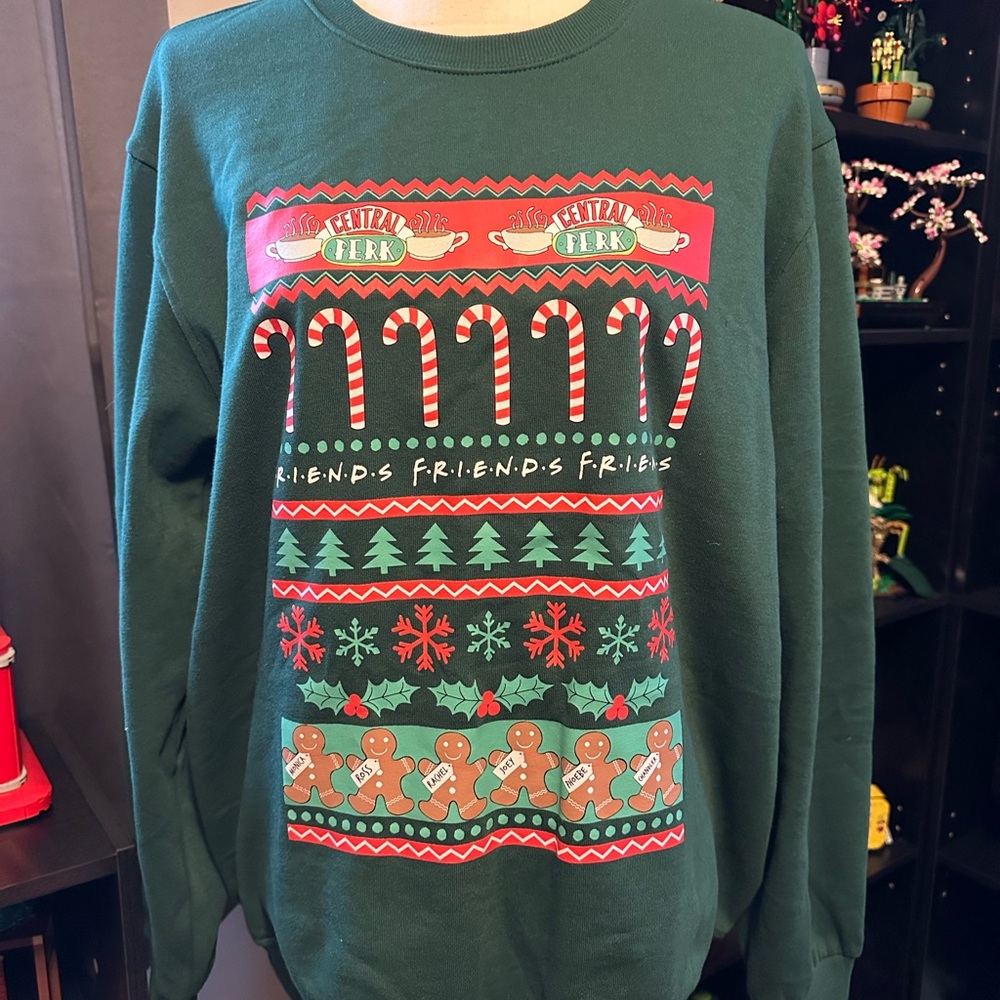 Green Holiday Sweater with Festive Design